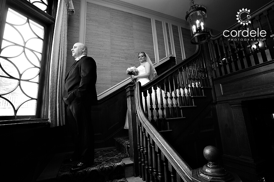 A bride walks towards her groom for her first look at the Endicott Estate in Dedham