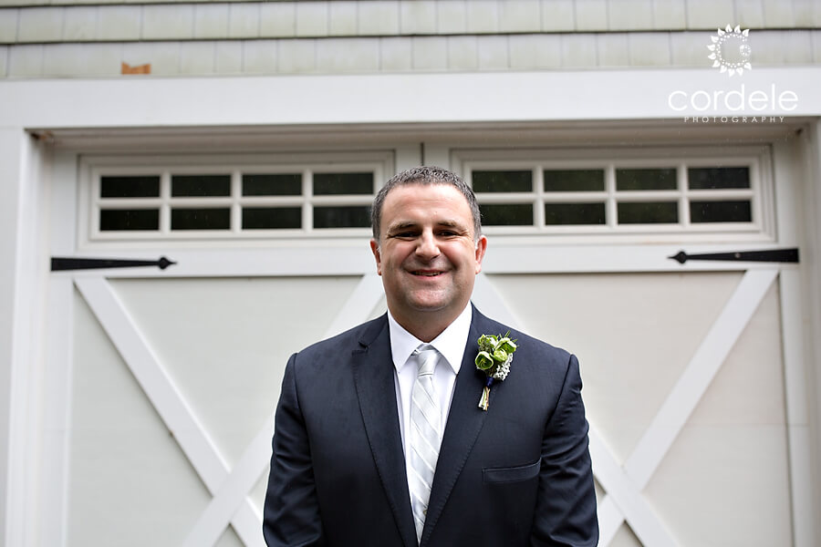 Photo of a groom outside Chequessett 