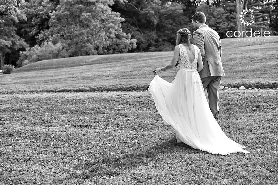 Bride and Groom walking at Codman Estae