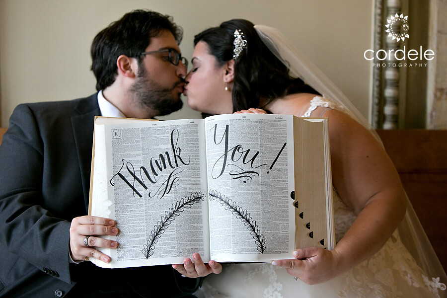 A bride and groom kissing